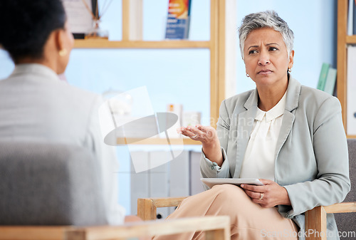 Image of Therapy, woman and psychologist with question, consultation and discussion for mental health issues. Therapist, medical professional or female client in session, conversation or advice for depression