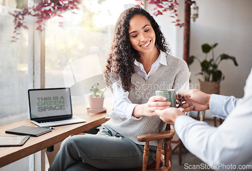 Image of Serving, remote work and a woman with a coffee from a waiter at a restaurant. Happy, service and a worker giving a girl a warm beverage while working on a laptop at a cafe on a break in the morning