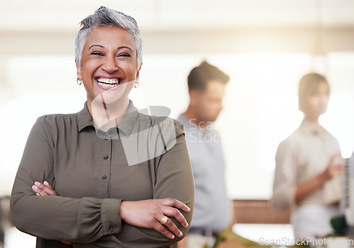 Image of Happy, pride and portrait of a woman with arms crossed in a meeting, seminar or workshop. Smile, leadership and elderly ceo smiling for success of a company at a conference or coworking space