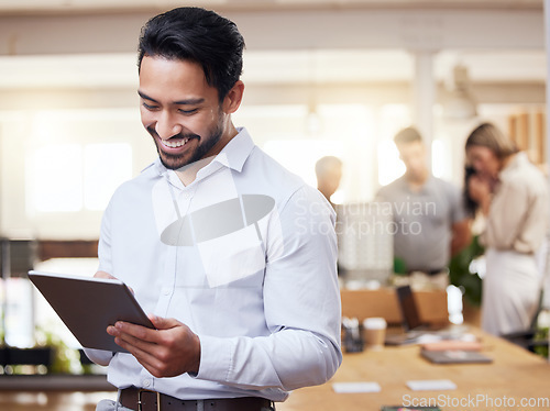 Image of Tablet, architecture and research with an engineer man in his office, reading an online blueprint. Technology, building and planning with a male architect looking at plans for a construction project