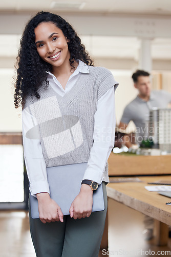 Image of Happy, office and portrait of a woman at work for business, administration and executive job. Smile, morning and a corporate employee standing in the workplace with technology working at an agency