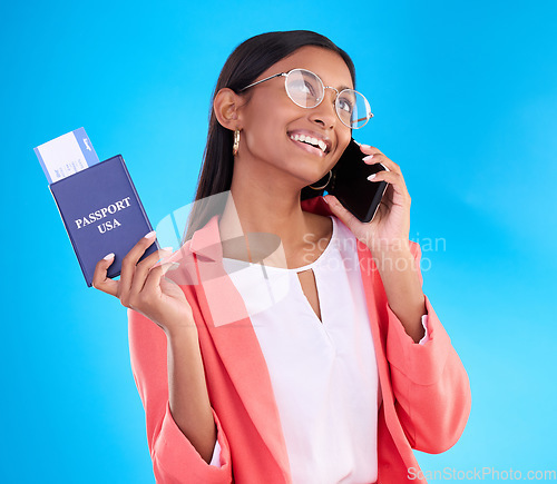 Image of Happy woman, phone call and passport or ticket for travel, flight or USA documents against blue studio background. Female business traveler smile for international boarding pass talking on smartphone