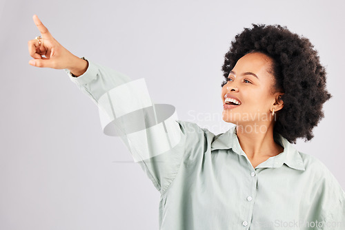 Image of Point, happy and black woman in studio smile with hand gesture for news, announcement and deal. Mockup space, white background and isolated girl pointing for promotion, product placement and showing