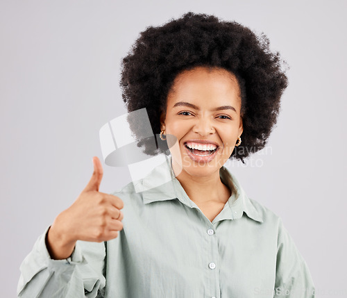 Image of Portrait, thumbs up and black woman laughing in studio isolated on a white background. Success, happiness and person with hand gesture or emoji for winning, approval or agreement, like or thank you.