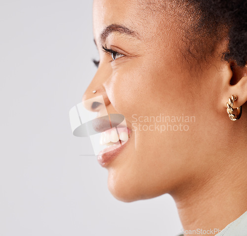 Image of Black woman, profile closeup and happiness smile in a studio thinking and feeling relax. Isolated, white background and happy model face with youth and natural afro with female empowerment and idea