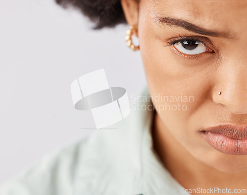 Image of Sad, depression and portrait of black woman in studio with upset, unhappy and depressed facial expression. Mental health, mockup and face of girl on white background with emotions, sadness and frown