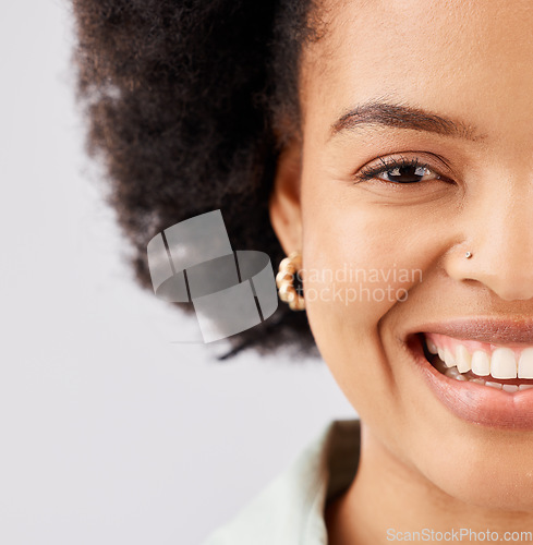 Image of Face, happy and portrait of black woman in studio with smile, confidence and happiness on white background. Advertising, success mockup and half of girl with positive mindset, pride and empowerment