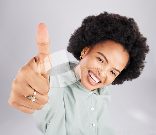 Image of Portrait, thumbs up and black woman top view in studio isolated on a white background. Success, happiness and person with hand gesture or emoji for winning, approval or agreement, like or thank you.