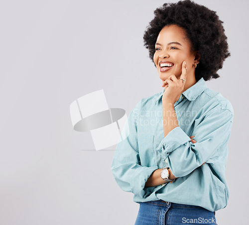 Image of Thinking, smile and mockup with a woman on a gray background in studio for product placement. Idea, happy and space with an attractive young afro female contemplating a though on blank mock up