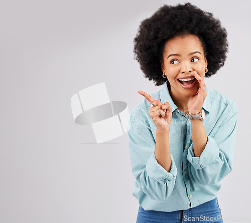 Image of Gossip, wow and woman pointing in a studio telling a secret feeling shocked and surprised. Whisper, deal news and female with hand over mouth for privacy with isolated white background and mockup