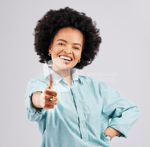 Image of Portrait, thumbs up and black woman laughing in studio isolated on a white background. Success, happiness and person with hand gesture or emoji for winning, approval or agreement, like or thank you.