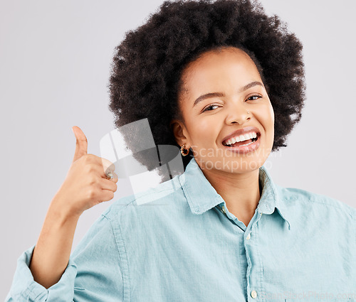 Image of Portrait, thumbs up and black woman laughing in studio isolated on a white background. Success, happiness and person with hand gesture or emoji for winning, approval or agreement, like or thank you.