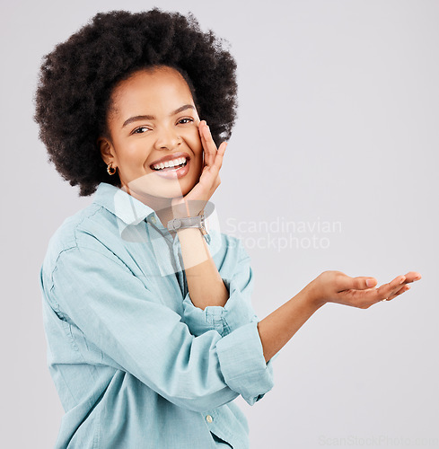 Image of Product placement, hand and portrait of black woman in studio for branding, advertising and choice gesture. Promotion, mockup space and happy girl show hands for marketing, presentation and logo
