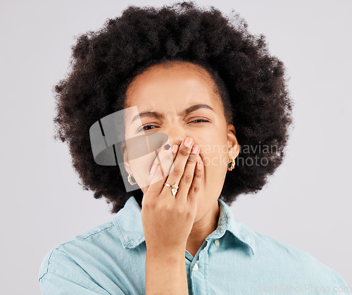 Image of Yawning, studio and portrait of a woman tired with insomnia and sleep problem. Isolated, white background and fatigue of a young and female model lazy and ready for sleeping and rest covering mouth