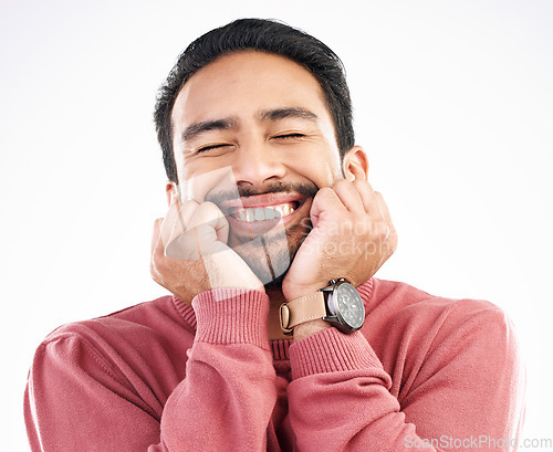 Image of Happy man, smile and cute face in a studio looking attractive and handsome in emoji expression. Isolated, white background and Asian model with cheerful, silly or happiness pose dreaming about idea