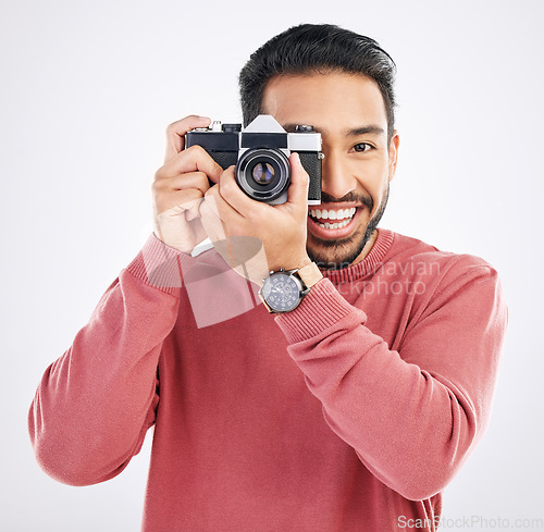 Image of Happy, photographer and portrait of Asian man with a camera isolated on a white background in studio. Smile, work and a Japanese journalist in photography taking pictures for the media or paparazzi