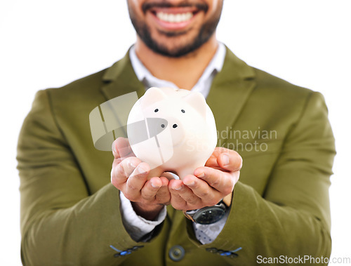 Image of Smile, piggy bank in hands and businessman in studio with happy financial freedom and security savings. Happiness, Indian man with money box and saving by investing in small business startup plan.