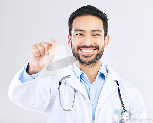 Image of Doctor portrait, studio pills or happy man with pharmaceuticals, drugs or medicine supplement. Healthcare support, medical pharmacy or male pharmacist with prescription medication on white background