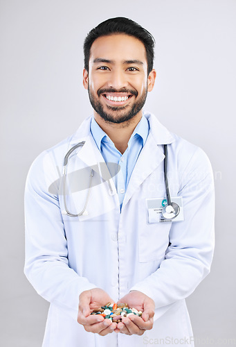 Image of Pharmacist portrait, studio drugs or happy man with pharmaceuticals, pills or medicine supplement. Healthcare support, medical pharmacy or male doctor with prescription medication on white background