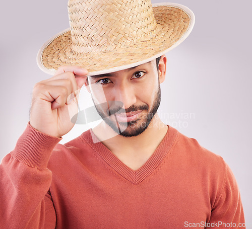 Image of Happy, stylish and portrait of an Asian man with a hat isolated on a white background in a studio. Fashionable, confident and a Japanese guy showing classic headwear with confidence on a backdrop