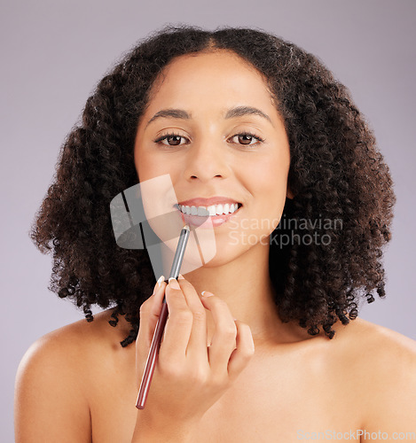 Image of Portrait, makeup and woman with lipliner, skincare and grooming on purple studio background. Face, confident female or happy model with pencil, cosmetics or facial glow on smooth, soft or beauty skin