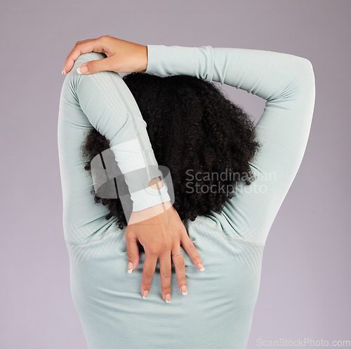 Image of Stretching, arms and back of a woman for fitness isolated on a studio background. Training, preparation and a girl with a warm up and body stretch for exercise, workout and sports on a backdrop