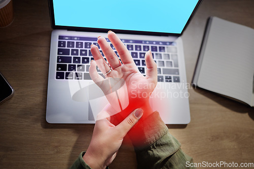 Image of Wrist pain, hands and woman at desk with laptop, green screen and mockup with injury and red overlay. Palm, muscle tension and anatomy with health, female working night with carpal tunnel and injured