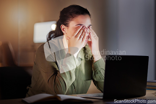 Image of Night, business and woman with burnout, tired and overworked with deadline, schedule and new project. Female consultant, employee and entrepreneur exhausted, working late or unproductive in workplace