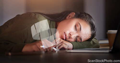 Image of Tired, business woman and sleeping in office at night with burnout, stress problem and low energy in evening. Fatigue, lazy and overtime female employee nap at table, deadlines and rest of overworked