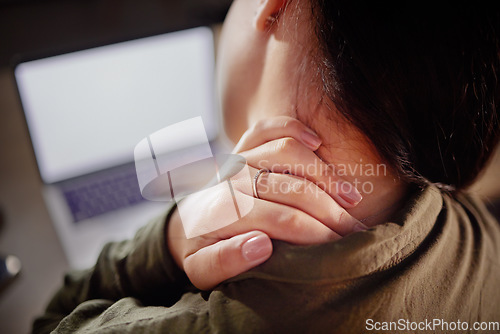 Image of Neck pain, hand and woman with closeup at desk with laptop, stiff joint with injury and hurt. Burnout, muscle tension and anatomy with health mockup, female working with bad posture and injured