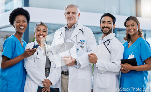 Image of Hospital, doctor team portrait and leadership smile in clinic feeling happy with vision. Healthcare, wellness and diversity group with nursing solidarity and stethoscope ready for medical teamwork