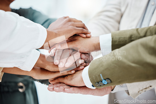 Image of Teamwork, collaboration and hands stack of business people for motivation, support and community. Diversity, team building and hand of men and women together for goals, trust and solidarity in office