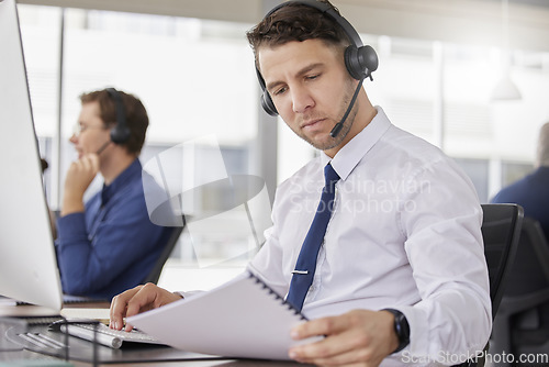 Image of Call center, business man and corporate paperwork of a telemarketing employee with a document. Reading, online consultation and web support worker with consulting script and conversation point list