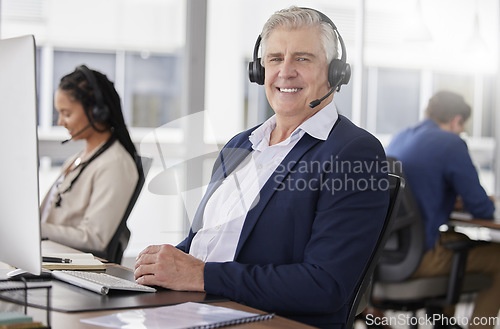 Image of Call center portrait, happy or friendly man in communication, speaking or talking to help with customer services. Smile, crm or mature sales agent with microphone in crm technical support office