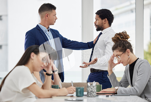 Image of Team, frustrated and business people with conflict in office with problem, crisis and stressed out in meeting. Fight, corporate and men and women in serious discussion for mistake, risk and warning