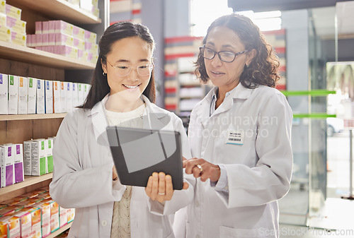 Image of Pharmacist, tablet and teamwork of women in pharmacy for healthcare, stock take or online consultation. Telehealth, collaboration or happy medical professionals in discussion of touchscreen research.