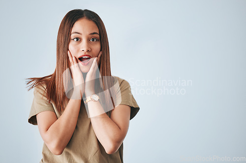 Image of Surprise, excited and portrait of woman in studio on white background for good news, announcement and sale. Fashion, mockup space and happy girl with cosmetics for advertising, marketing and discount