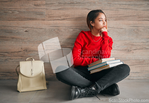 Image of University, woman with books on floor and and thinking, mock up space and education at academic college. Information, knowledge and backpack, student on floor with concentration and book to study.