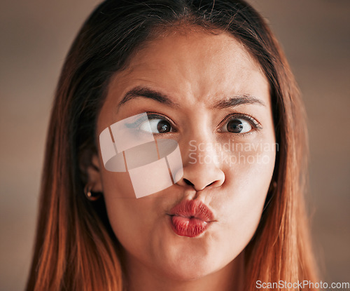 Image of Funny face, goofy and woman with emoji, silly and humor against a brown studio background. Female, joke and lady with facial expression, crazy and comics with personality, comedy and humour