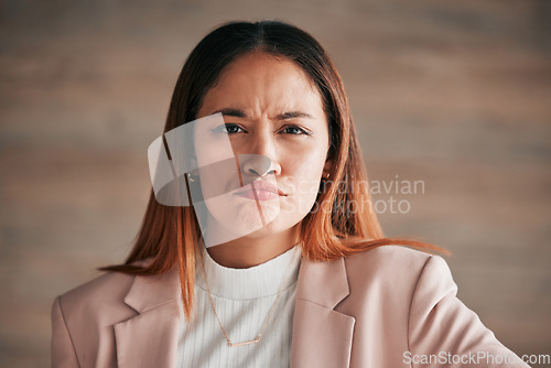 Image of Portrait, frown and business woman in office confused, unsure or unhappy on wall background. Face, sad and angry corporate employee, doubt and emoji expression, overwhelmed and wondering at new job