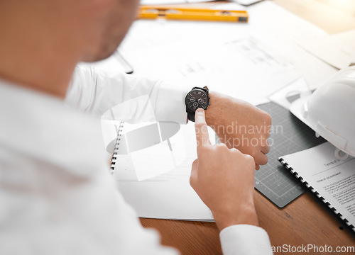 Image of Architect, hands and checking watch for time, schedule or planning in construction or project at office desk. Hand of contractor or businessman with arm wristwatch for tracking or monitoring times