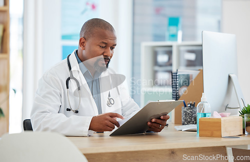 Image of Healthcare, black man and doctor with clipboard, report and information for procedure, schedule and details. African American male employee, surgeon or medical professional with documents or feedback