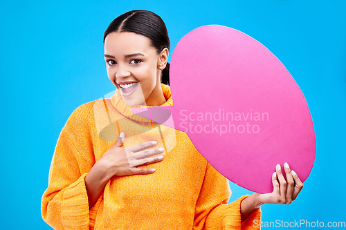 Image of Speech bubble, wow and portrait of woman with banner in studio for advertising on blue background. Face, omg and female with poster, mockup and space for social media, announcement or billboard news