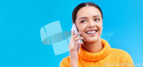 Image of Happy woman, phone call and communication on mockup for social media, conversation or chat against a blue studio background. Female smiling on mobile smartphone in discussion or talking on copy space