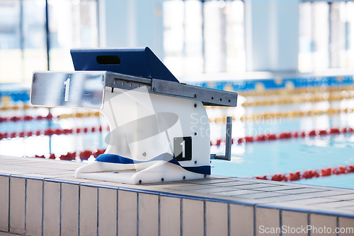 Image of Start, platform and dive with block at swimming pool for championship, jumping and race. Fitness, competition and wellness with lane in indoor arena for exercise, workout and water sports training