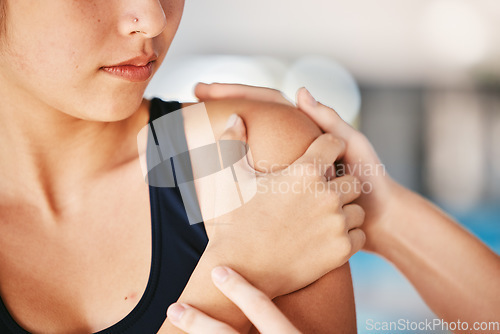 Image of Woman, shoulder pain or girl swimmer with injury after exercise, training or workout accident in practice. Helping hands, sports athlete or closeup of person with tendinitis, muscle or broken bone