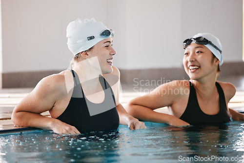 Image of Swimming pool, sports and women laughing in water, joke and funny comedy after exercise. Swimmer, happiness and friends or girls talking, laughter and comic discussion with humor after training.