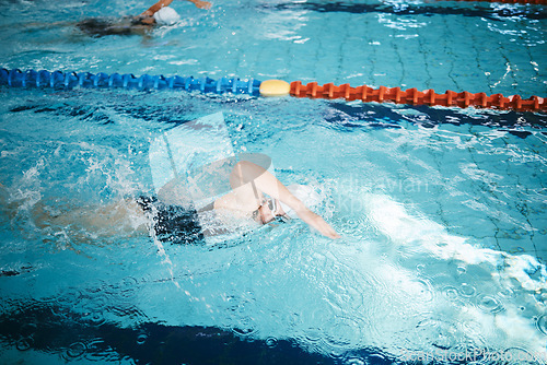 Image of Race, sports and people swimming in a pool for cardio, competition and training. Fitness, exercise and athletes in the water for recreation, a hobby or practicing laps for sport and a workout