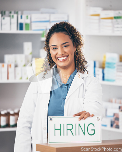 Image of Pharmacy woman, smile and poster in portrait for hiring, job and opportunity in healthcare store. Pharmacist, small business owner and paper for recruitment, onboarding and announcement for medicine