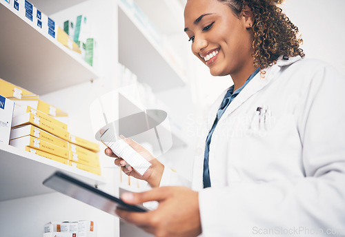 Image of Tablet, stock and medical with a pharmacist woman at work to fill an online order or prescription. Healthcare, product and insurance with a female working as a medicine professional in a pharmacy